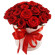 красные розы в шляпной коробке. Польша